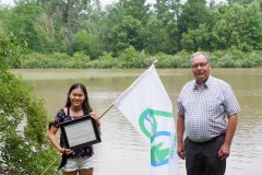Johanna Ni Xiu deKoning (left) is awarded with the 2021 Tony Stranak Conservation Scholarship by former St. Clair Region Conservation Authority Chair, Joe Faas (right).