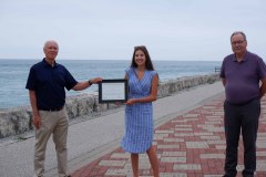 Lucie Slakmon (centre) is awarded with the 2021 Mary Jo Arnold Conservation Scholarship by former St. Clair Region Conservation Authority Chair, Joe Faas (right) and Vice-chair, Larry Gordon (left).