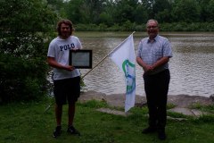 Zachary Zavitz (left) is awarded with the 2021 A.W. Campbell Memorial Scholarship by former St. Clair Region Conservation Authority Chair, Joe Faas (right).