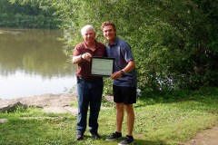 Cameron Vieira (left) is awarded with the A.W. Campbell Memorial Scholarship by St. Clair Region Conservation Foundation President, Duncan Skinner (right).