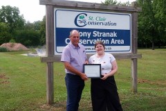 Lilliana Ovecka-Doskas (right) is awarded with the A.W. Campbell Memorial Scholarship by St. Clair Region Conservation Authority Chair, Greg Grimes (left).