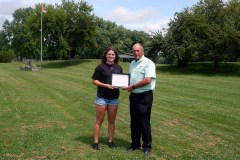 Khloe Tinning (left) is awarded with the Mary Jo Arnold Conservation Scholarship by St. Clair Region Conservation Authority Chair, Greg Grimes (right).