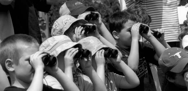 Kids exploring with binoculars Header Sponsors
