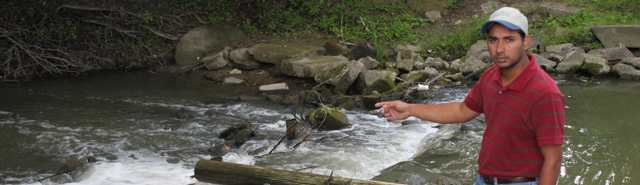 SCRCA Staff Monitoring Base Flow Header Low Water