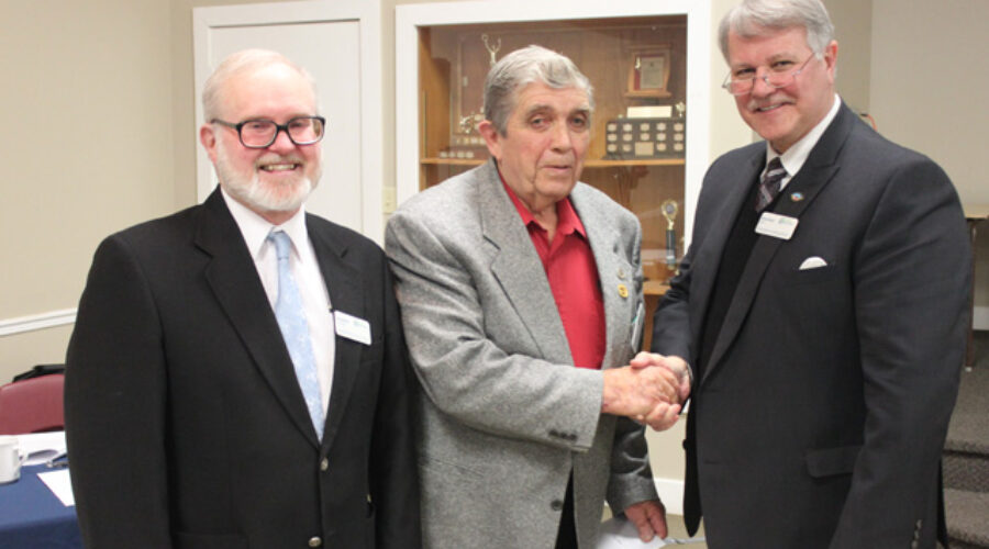 from left to right, Terry Burrell, Vice Chair, Bill Bilton retiring after 20 years of service and Steve Arnold,Chair