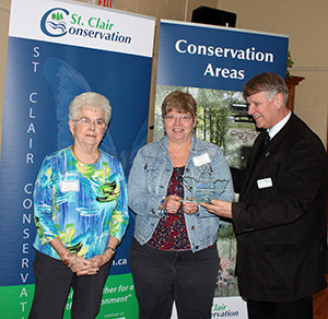 Janice Dolliver and Janet Campbell from the Envirofriends of Coldstream receive their award from Steve Arnold, SCRCA Chair