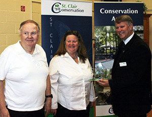 John King and Mary-Ellen King receive their award from Steve Arnold, SCRCA Chair