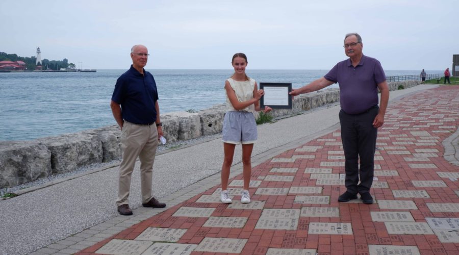Nicole Guthrie (centre) is awarded with the A.W. Campbell Memorial Scholarship by St. Clair Region Conservation Authority Chair, Joe Faas (right) and Vice-chair, Larry Gordon (left).