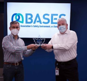 John Brennan, Vice chair of the SCRCA presents Vince Gagner, General Manager of BASES with the 2022 Conservation Award