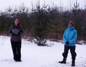Emily Elder accepts the 2022 Conservation Award on behalf of David Livingstone from SCRCA Vice chair John Brennan