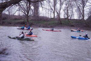 Race participants in their kayaks on the Sydenham River
