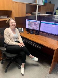 Picture of SCRCA staff at desk with maps displayed on computer